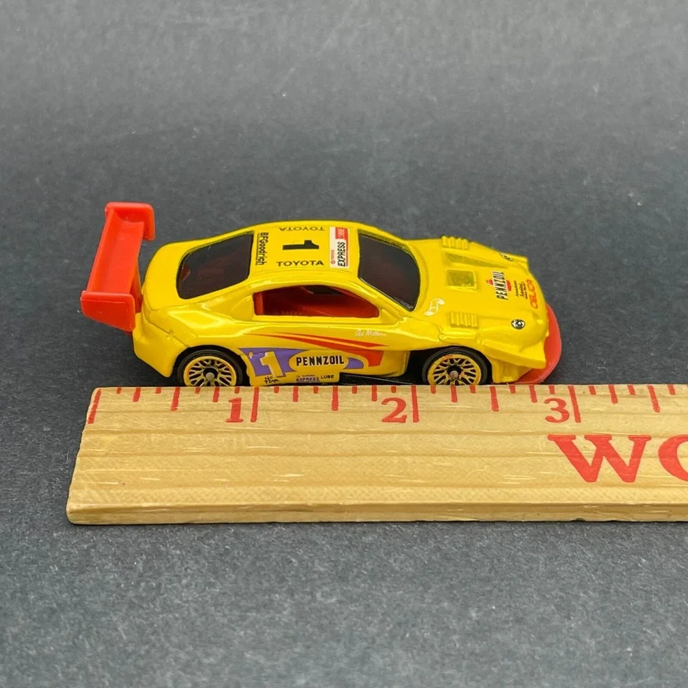 Hot Wheels Pennzoil #1 Toyota Pikes Peak‎ Celica Race Car Yellow Diecast 1/64
